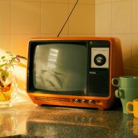Folk old objects nostalgic collection black and white TV recorder telephone alarm clock horse head clock ornaments props
